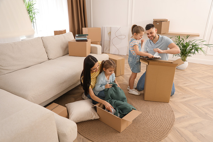 Unpacking boxes in the living room